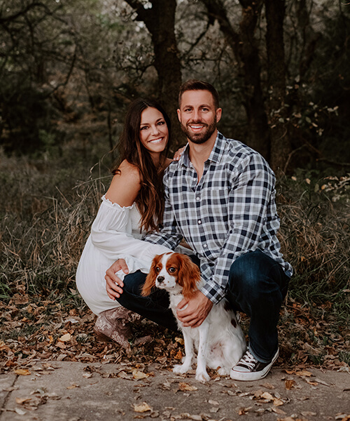 Dr. Bret Williamson with his wife and their dog